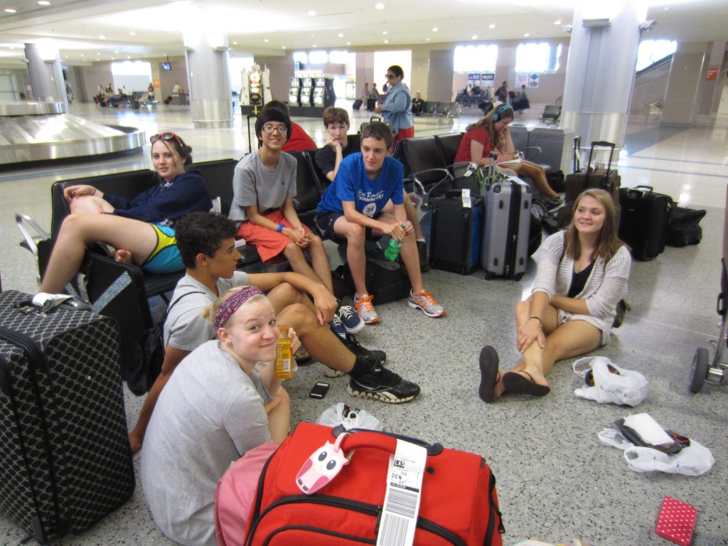 Students relax at the Vegas airport. 