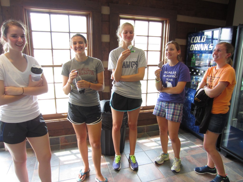 The McAuley girls enjoy the ambiance of the vending machine room. 