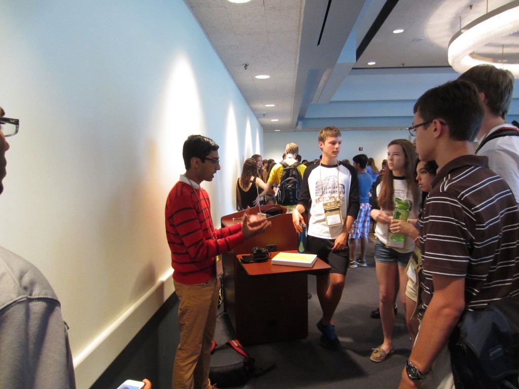 Narayan explains his ideas to a small crowd.