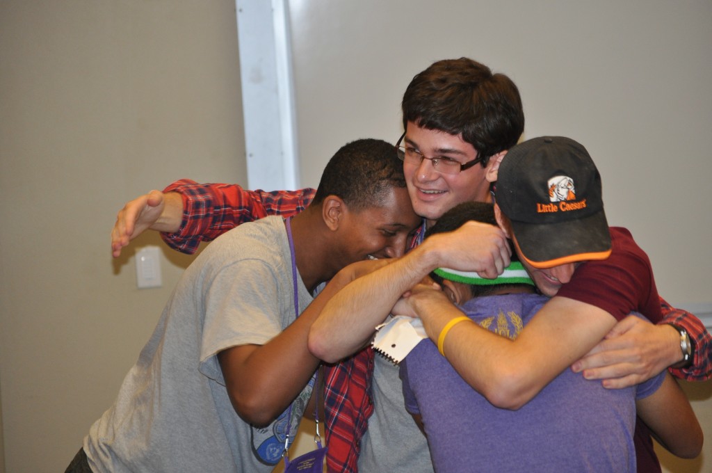 Matthew, Ben, Will, and Sameer celebrate after their victory in the Semi-FInals.