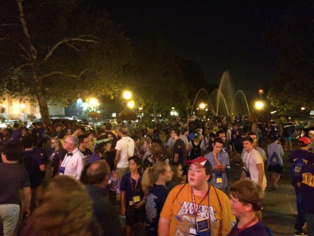 The crowd disperses after the talent show.  The Birth of Venus fountain is in the background.